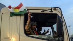 Combatentes curdos iraquianos rumam para cidade síria de Kobani