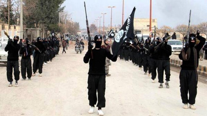 Extremistas do ISIS  em uma parada de rua em Raqqa , na Síria, em 14 de janeiro de 2014  (ISIS site via AP)