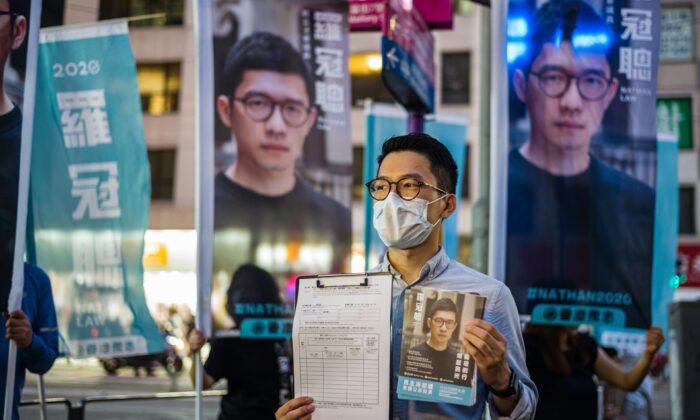 Membro do Demosisto da organização política pró-democracia e legislador desqualificado, Nathan Law, fala à imprensa em Hong Kong em 19 de junho de 2020 (Anthony Wallace / AFP via Getty Images)