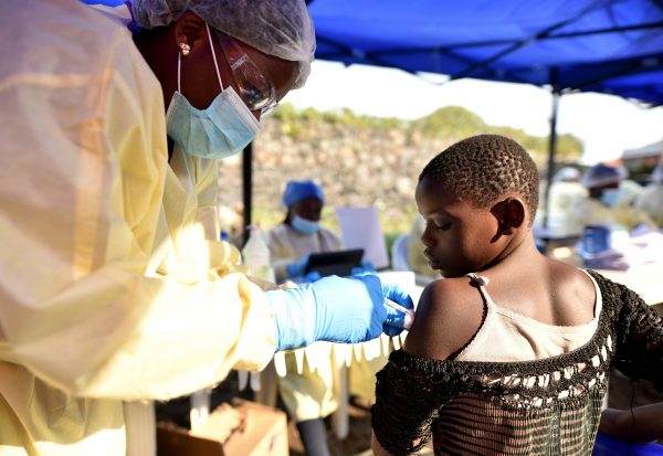 A Congolese health worker administers ebola vaccine to a child at the Himbi Health Centre in Goma, Democratic Republic of Congo, July 17, 2019. (Olivia Acland/Reuters)
