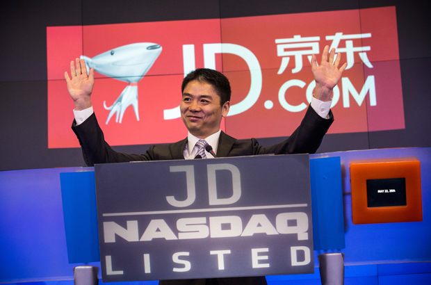 China, Partido Comunista Chinês, Xi Jinping, empresariado, pobreza - Liu Qiangdong gesticula durante a oferta pública inicial (IPO) de sua empresa JD.com na Bolsa de Valores Nasdaq em Nova York em 22 de maio de 2014 (Andrew Burton/Getty Images)